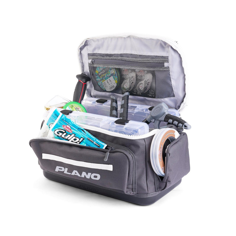 Open fishing tackle bag with visible contents on a white background, featuring the Plano brand.