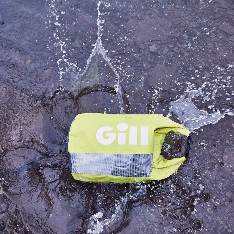 Lifestyle image of Sulphur 25L drybag splashing in water