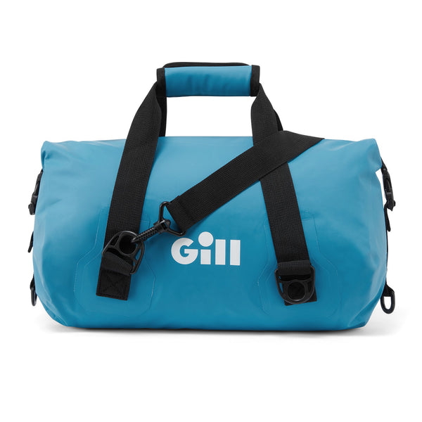 Gill 10L Duffel in Bluejay color with white Gill logo and black shoulder strap and grab handle