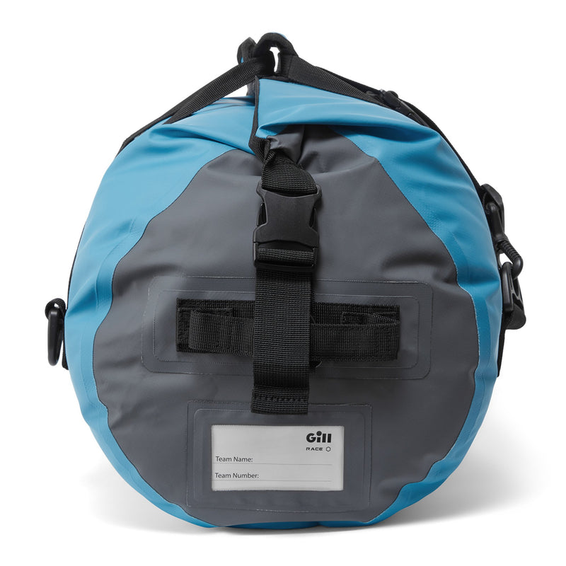 side end view of  30L duffle in bluejay color with gray ends and ID tag
