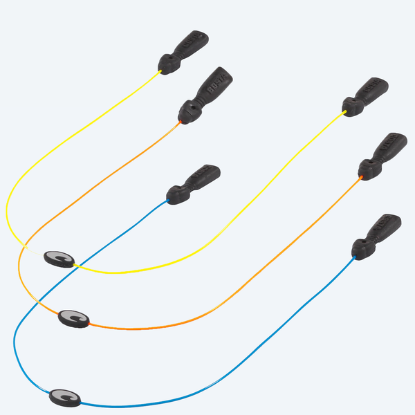 Group of C-Mono retainers in Yellow, Orange, and Blue