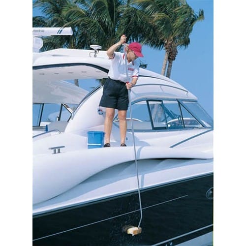 woman scrubbing side of boat using curved adaptor