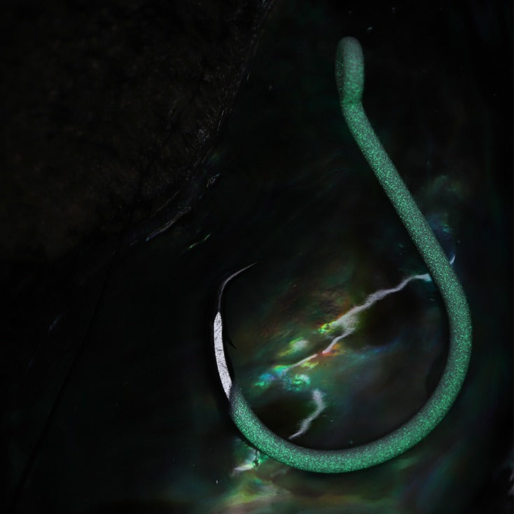 hook looking like it is glowing under water
