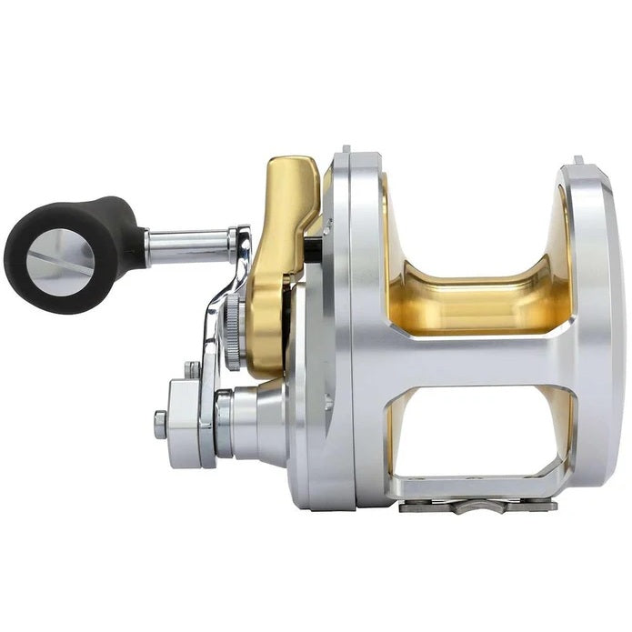 Fishing reel with gold and silver design on a white background