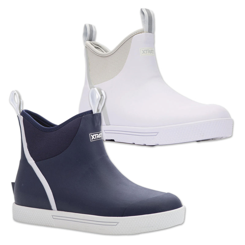 Navy and white rain boots with Xtratuf branding on a white background