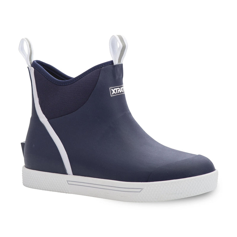 Navy boot with white rubber sole and pull on tabs