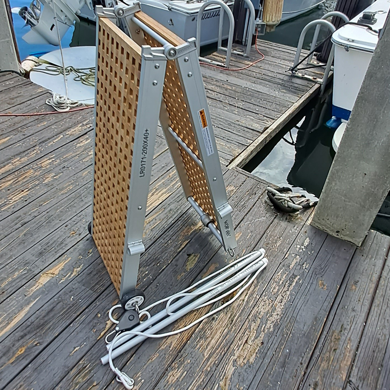 Folded bridge on dock