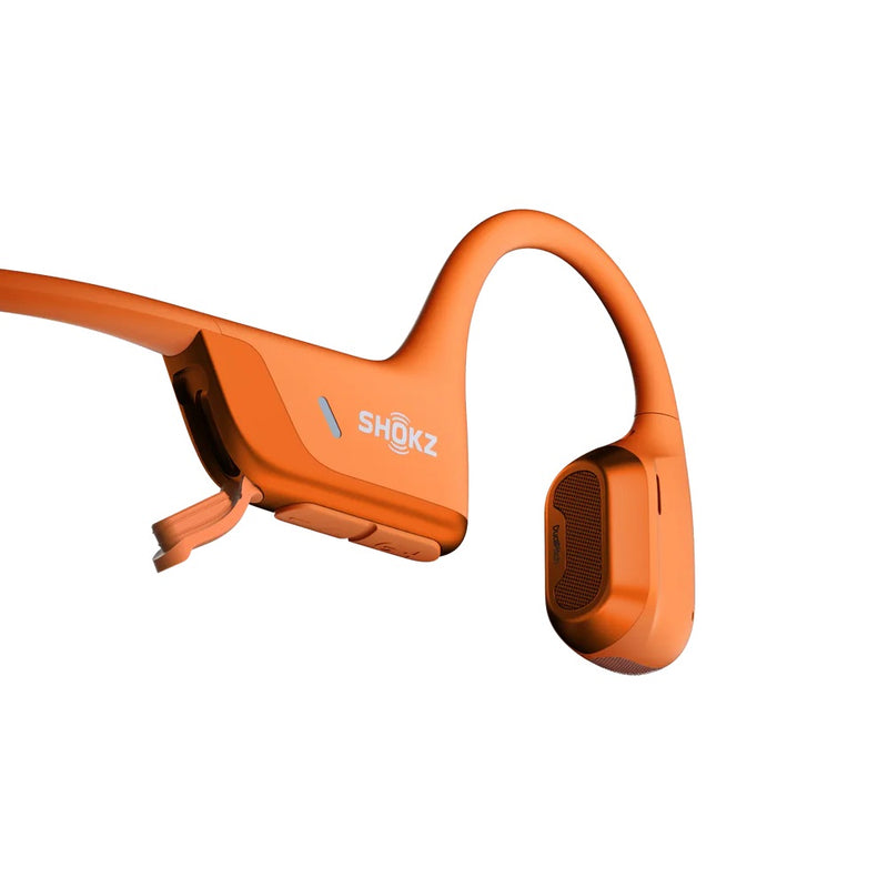 Close up view of Orange Shokz headphone