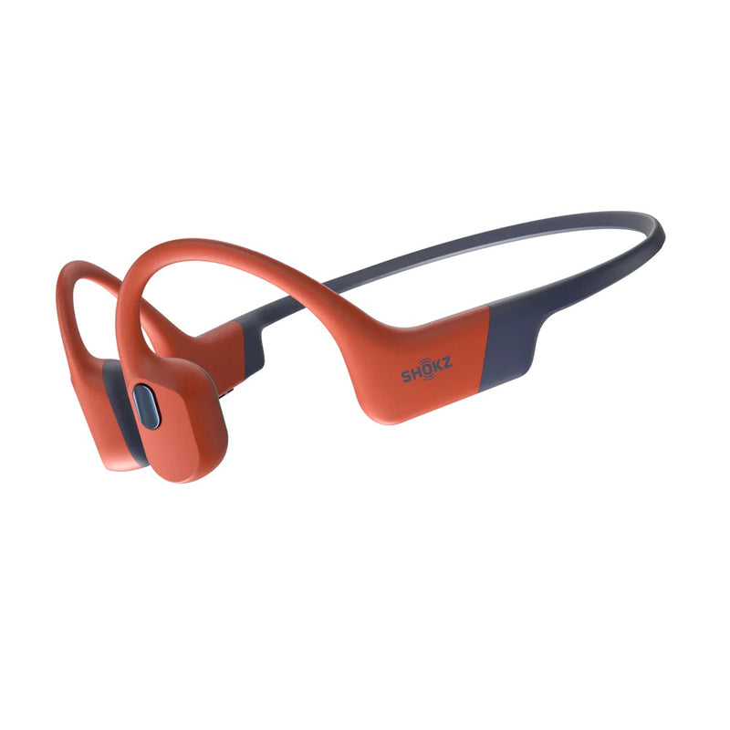 angled image of red and gray headphones showing SHOKZ logo