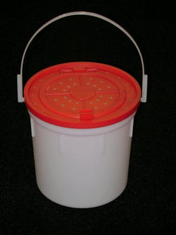 Red lid on white bucket with handle