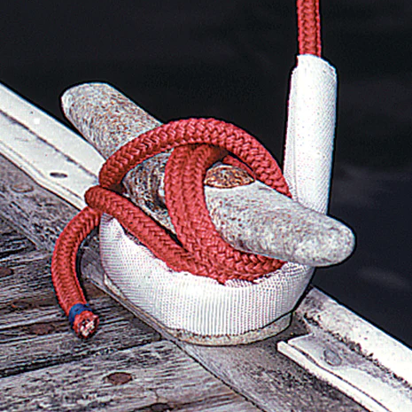 white chafe guard on red dock line around cleat