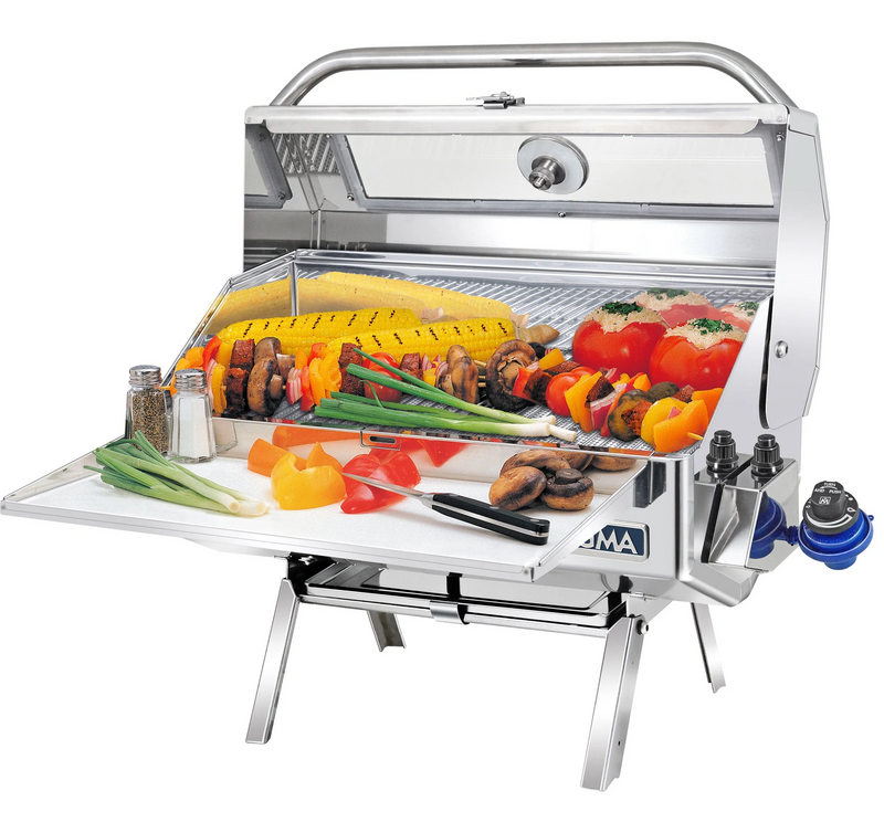 gas grill open lid with food on grill and tray