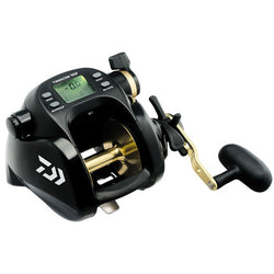 Wide black power reel. Gold spool and handle arm. Green LCD on the top center.