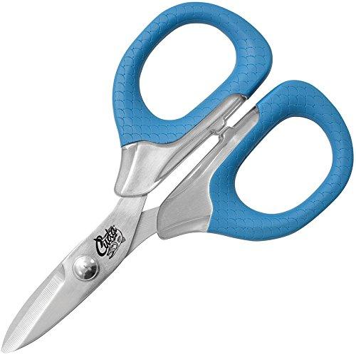 Close-up of short scissors with blue handles