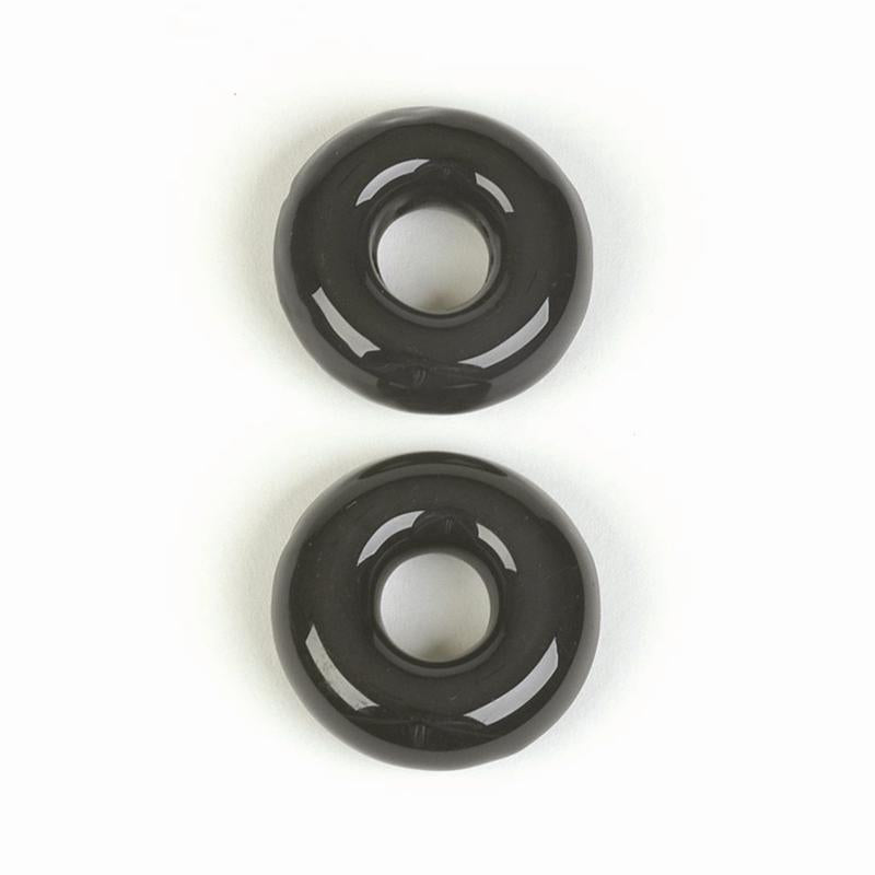 Two black glass rings