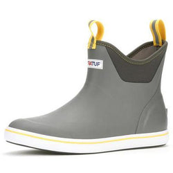 Angled product image of two-tone gray boot. Front and rear of cuff have a yellow and gray loop. Side of sole is white with yellow strip along the top.