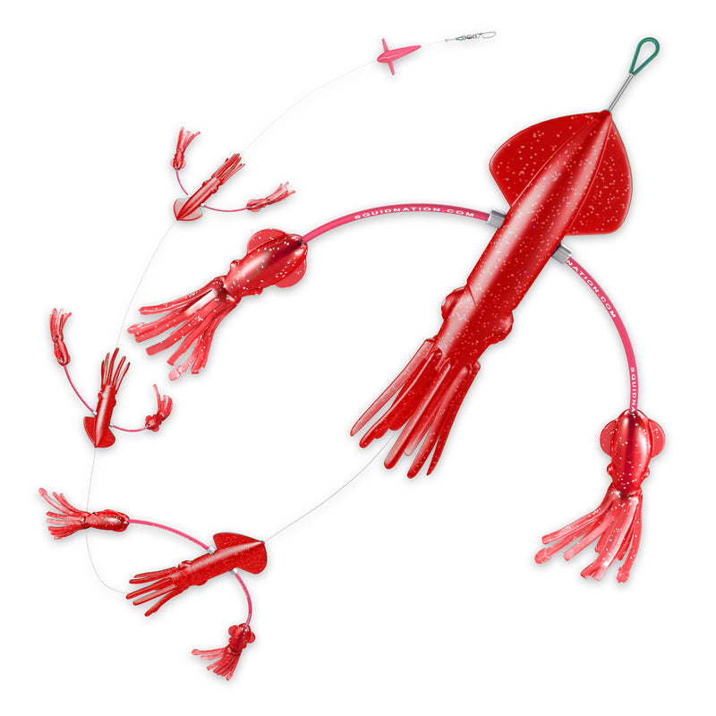 Glittery red body, fins, eyes, and tentacles squid set. There are four large squid with a bright red bent wire going across the center of the body with a small transparent red squid on either end. At the end of the metal wire they are joined by is a small weight with the same color scheme.