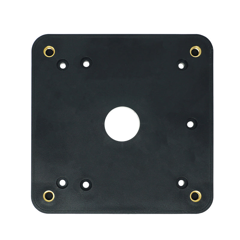 Square black plate with center whole cut out. Each corner contains gold-colored screw slots. Multiple other screw holes with indentations for flush mounting.