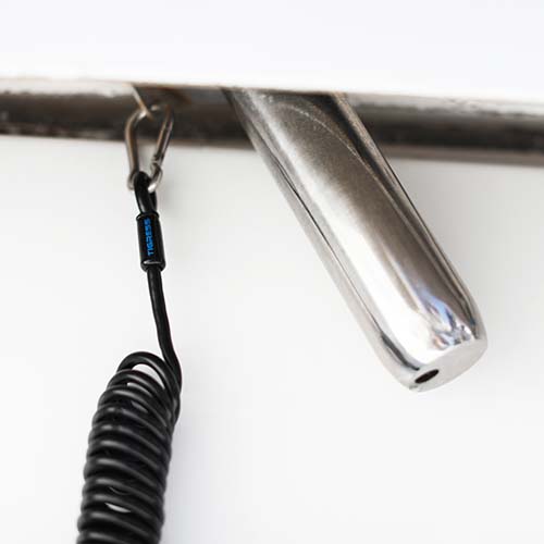 coiled safety tether shown in use